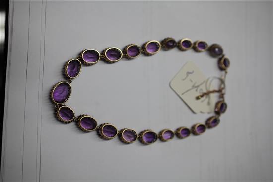 A gold and amethyst necklace, 16in.